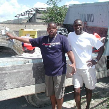 naseem_and_michael_placing_moulds_on_the_truck_to_be_shipped_ naseem_and_michael_placing_moulds_on_the_truck_to_be_shipped_